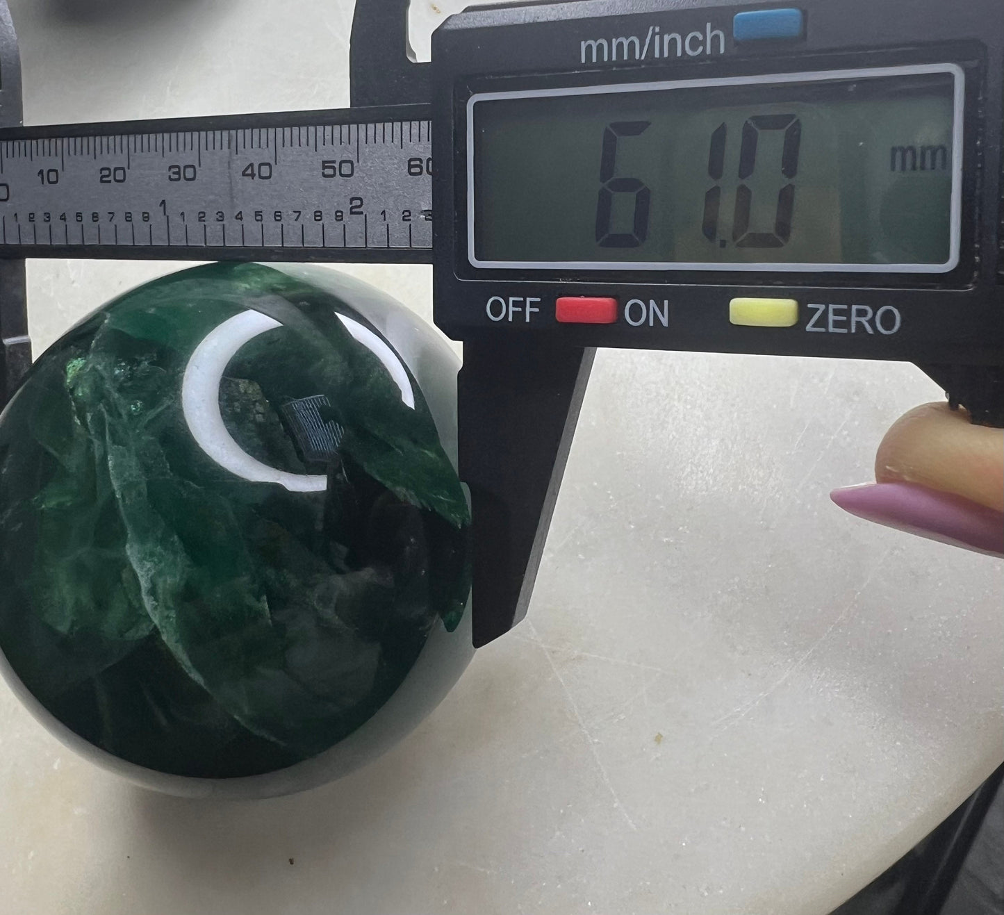 2 sphere set total weight 1pound 8oz. 1 moss agate and 1 dark green fluorite.