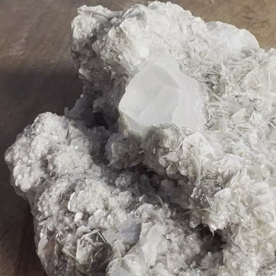 Aquamarine on mica mineral cluster is the small one and the uv reactive calcite you get both clusters. 36grams small and 428grams larger one