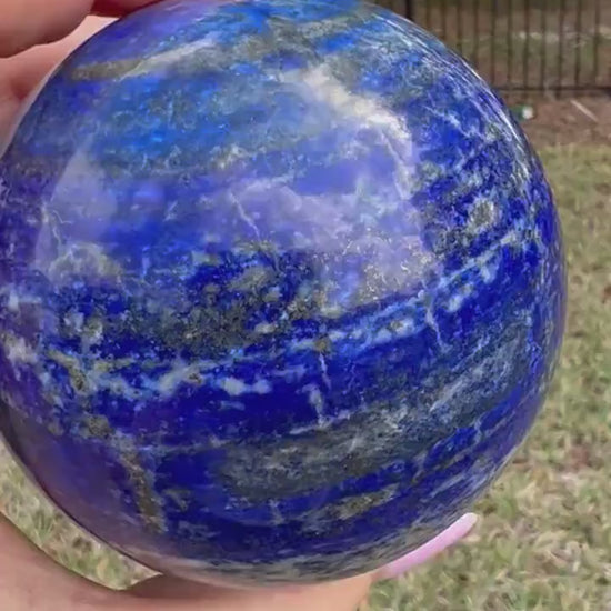 Natural lapis lazuli 74mm sphere 1 pound 7oz