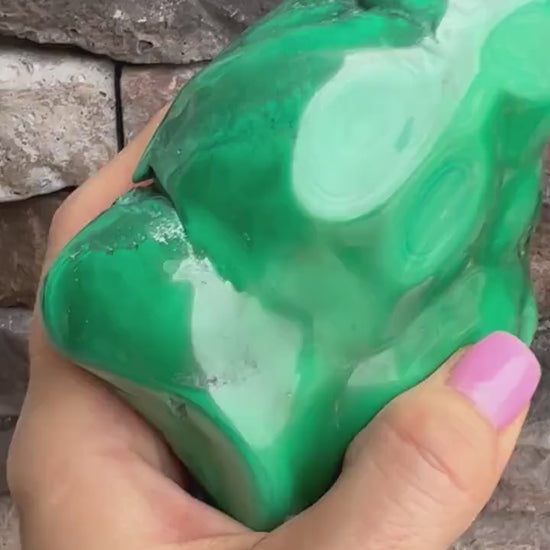 malachite polished from Congo almost 5 inches long and over 2 pounds.