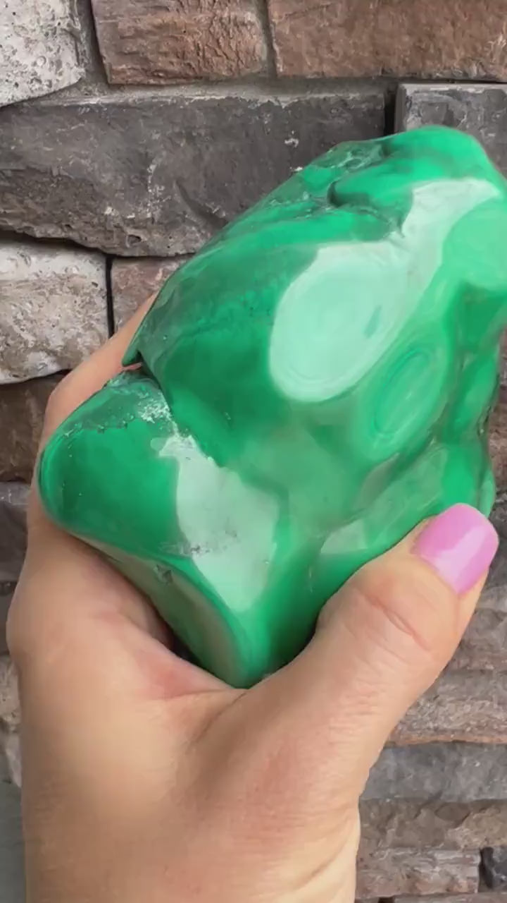 malachite polished from Congo almost 5 inches long and over 2 pounds.