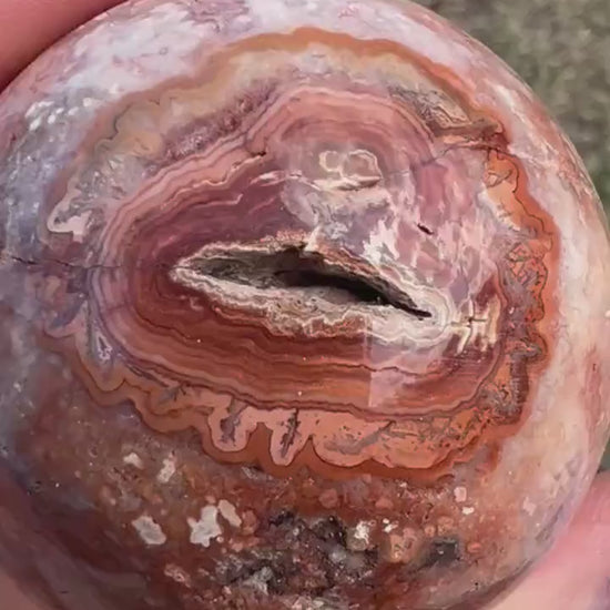 Pink/ peach crazy lace agate sphere 54mm