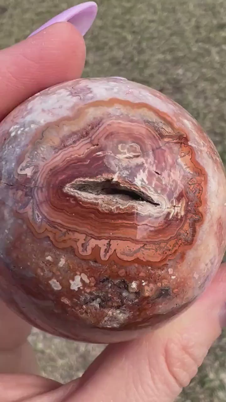 Pink/ peach crazy lace agate sphere 54mm