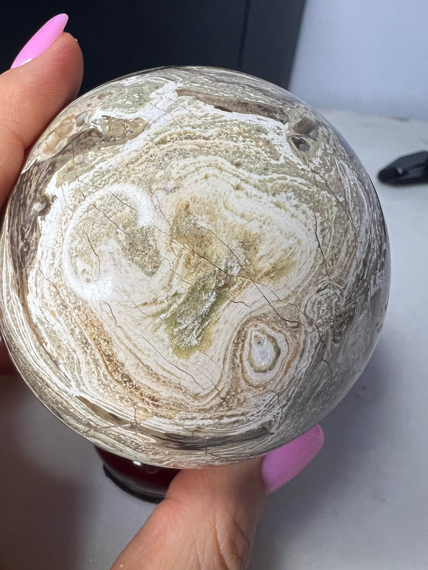 Petrified wood sphere. From Madagascar weight 1 pound 2.3oz 74.9mm druzy inclusion with this item