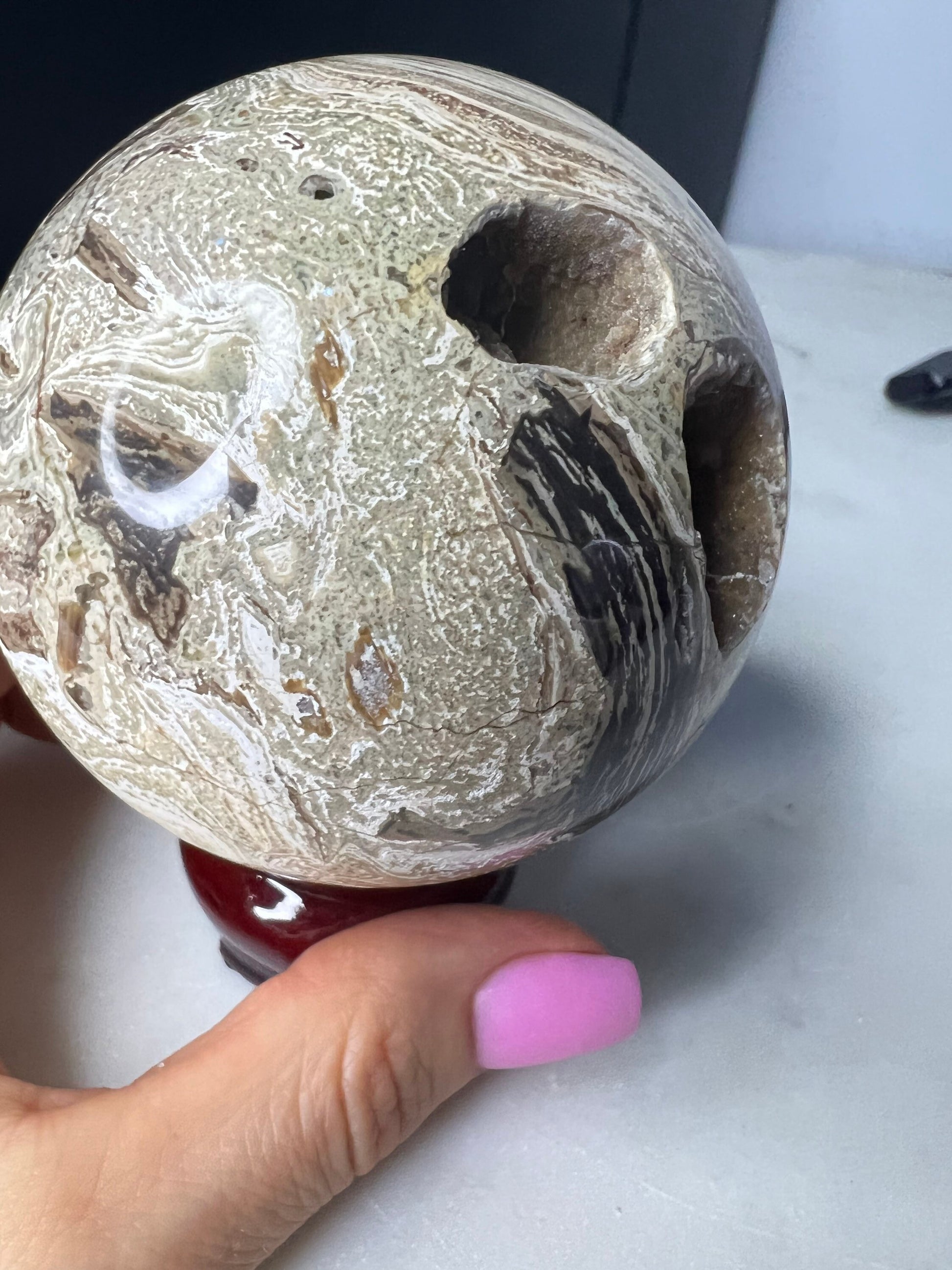 Petrified wood sphere. From Madagascar weight 1 pound 2.3oz 74.9mm druzy inclusion with this item