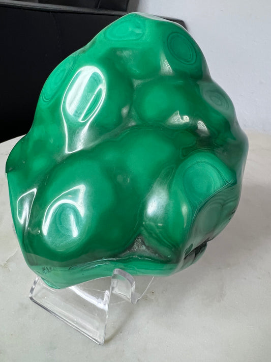 malachite polished from Congo almost 5 inches long and over 2 pounds.