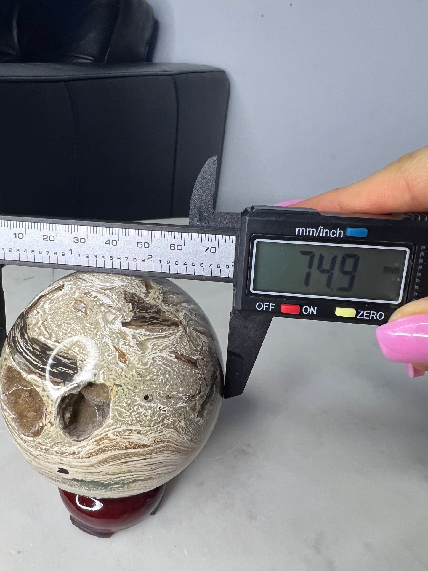 Petrified wood sphere. From Madagascar weight 1 pound 2.3oz 74.9mm druzy inclusion with this item