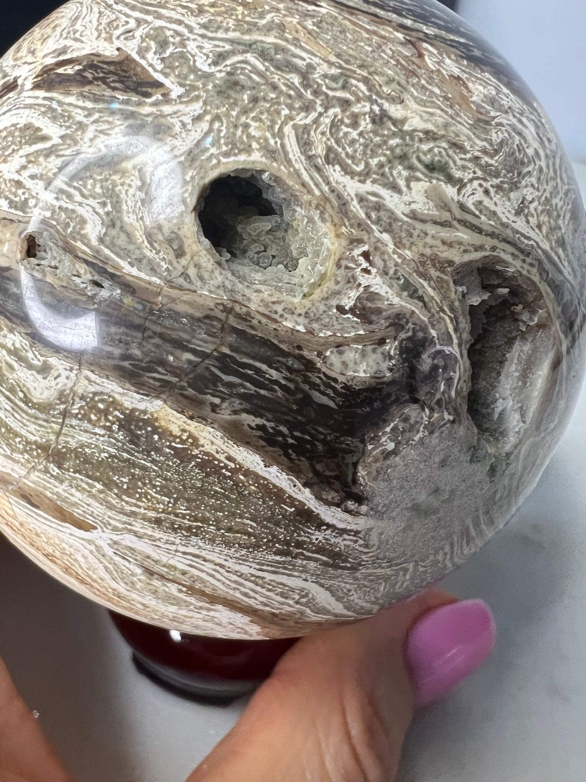 Petrified wood sphere. From Madagascar weight 1 pound 2.3oz 74.9mm druzy inclusion with this item