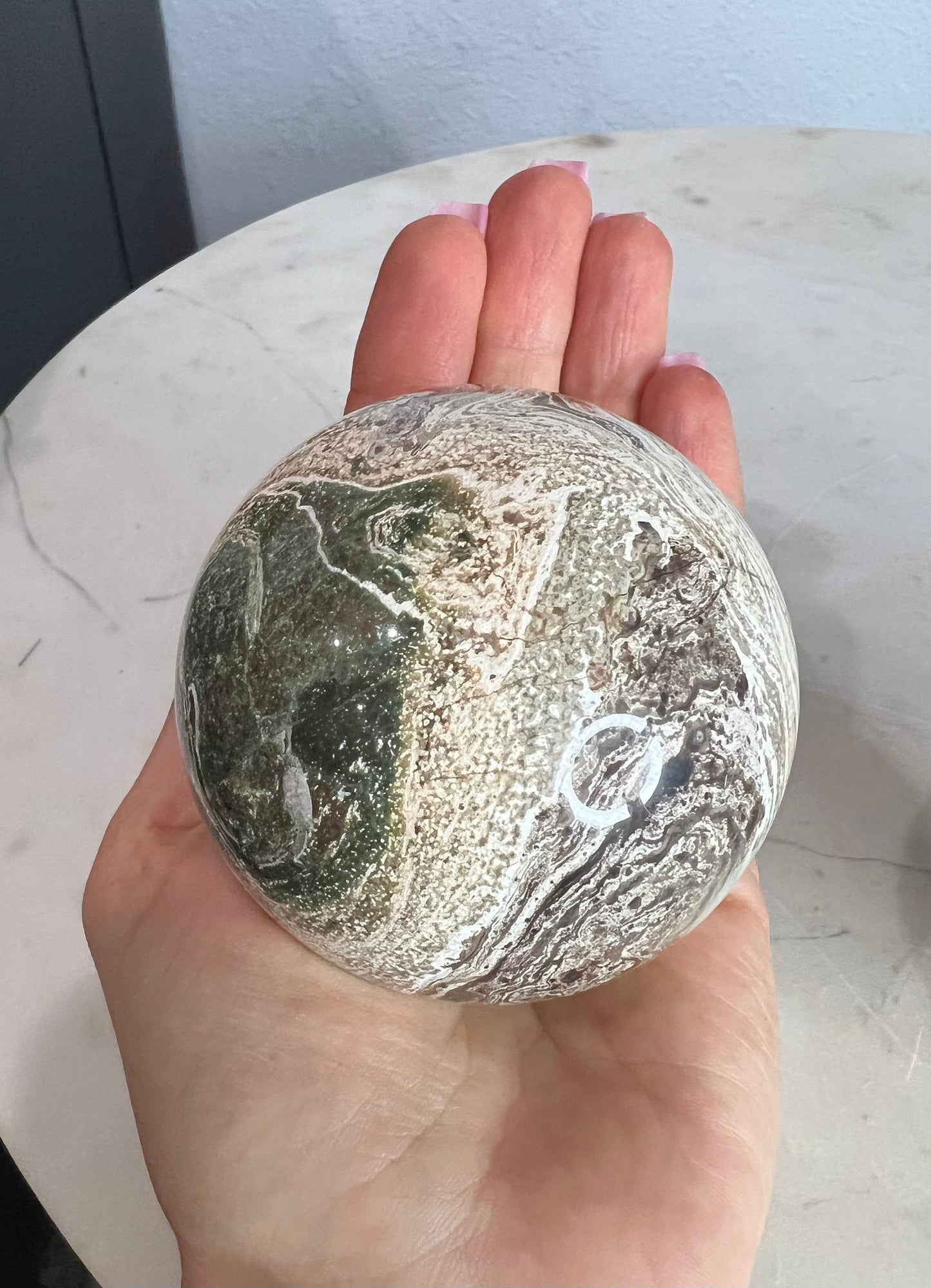2 Petrified wood spheres from Madagascar. You will get the 2 in the picture total weight 1 pound 13oz .