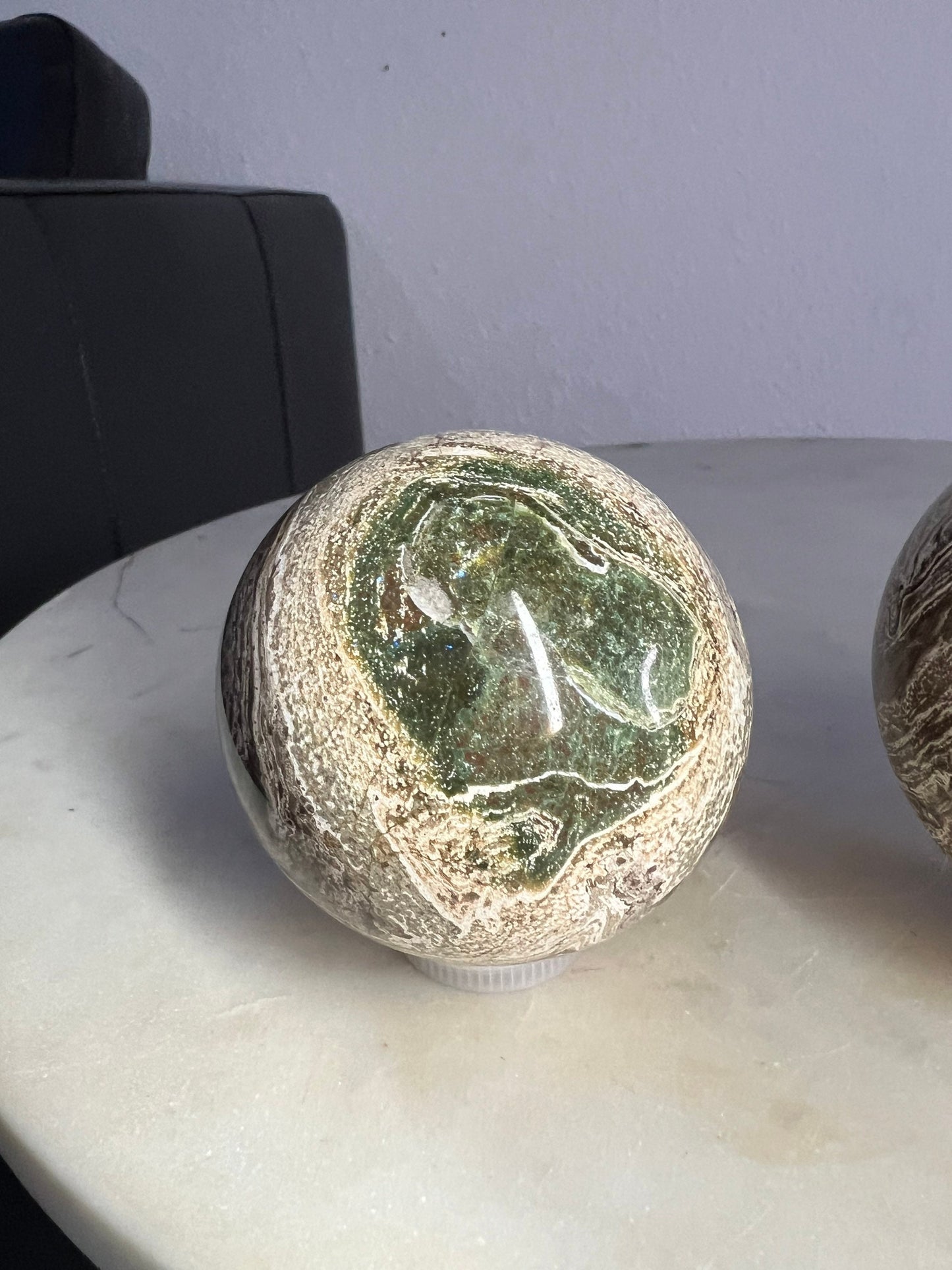 2 Petrified wood spheres from Madagascar. You will get the 2 in the picture total weight 1 pound 13oz .