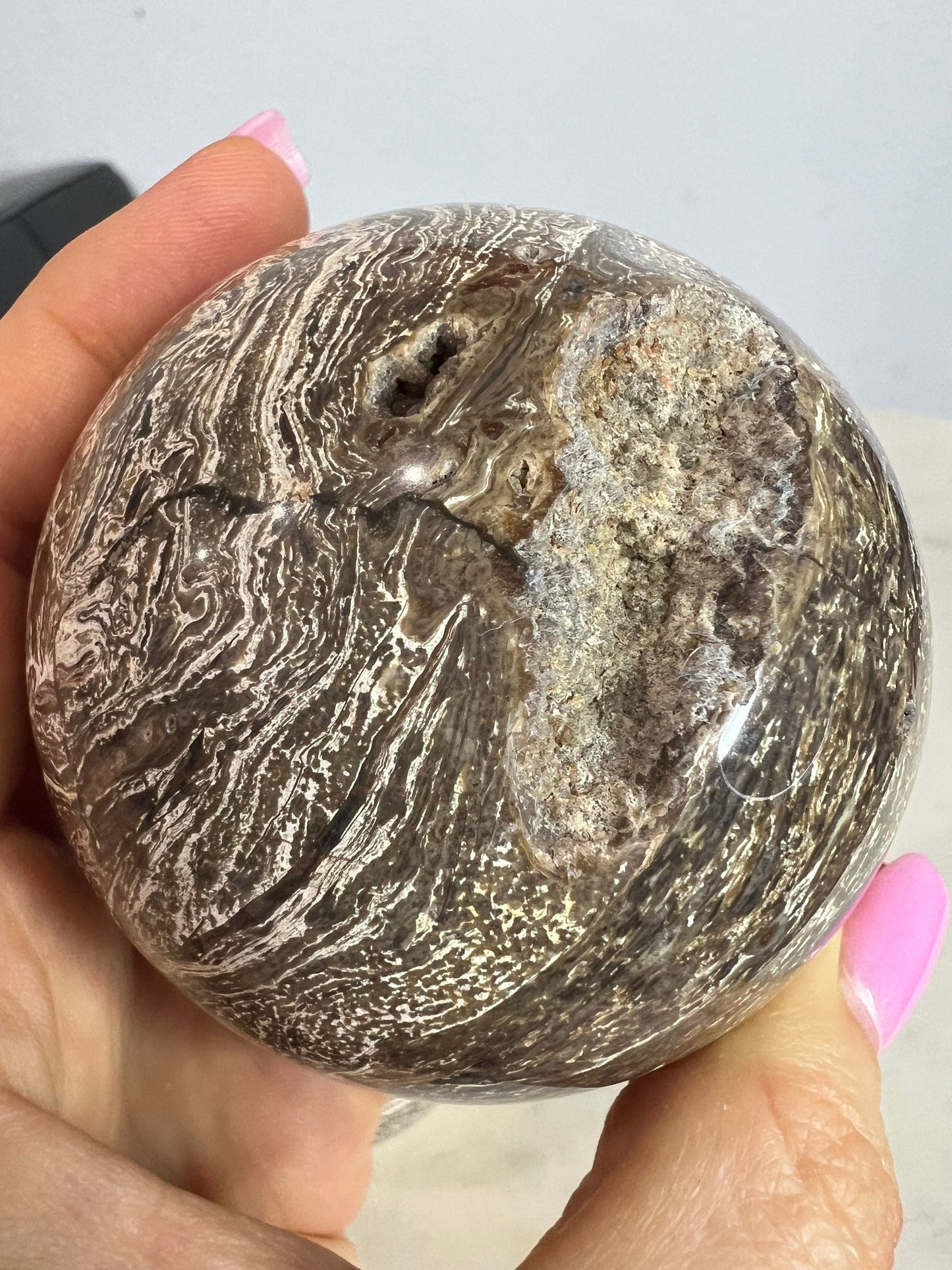2 Petrified wood spheres from Madagascar. You will get the 2 in the picture total weight 1 pound 13oz .