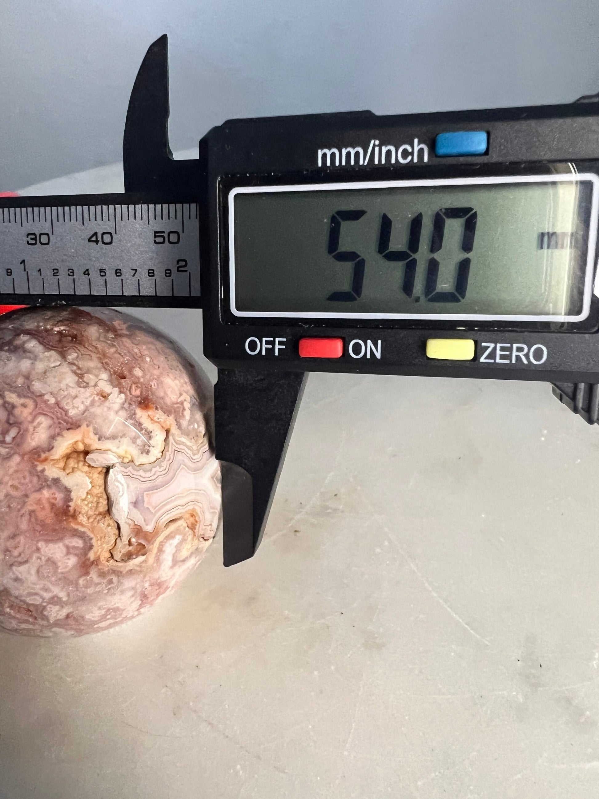 Pink/ peach crazy lace agate sphere 54mm