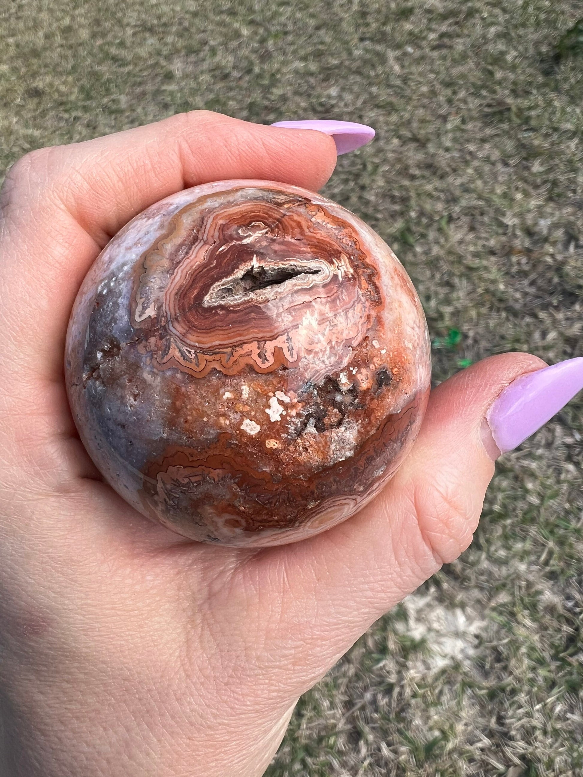 Pink/ peach crazy lace agate sphere 54mm