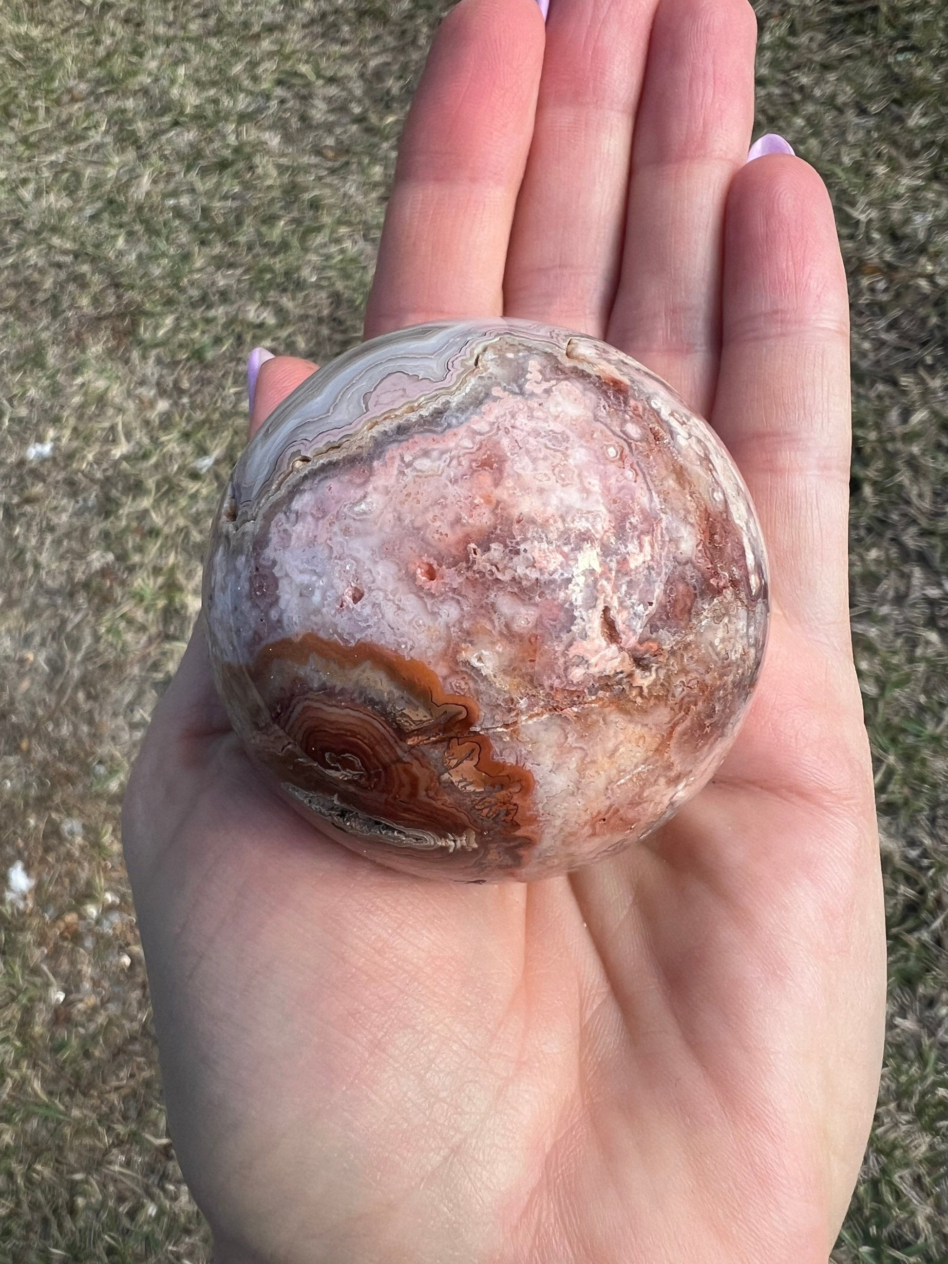 Pink/ peach crazy lace agate sphere 54mm