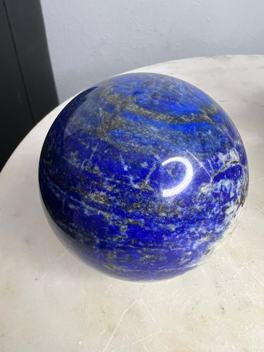 Natural lapis lazuli 74mm sphere 1 pound 7oz
