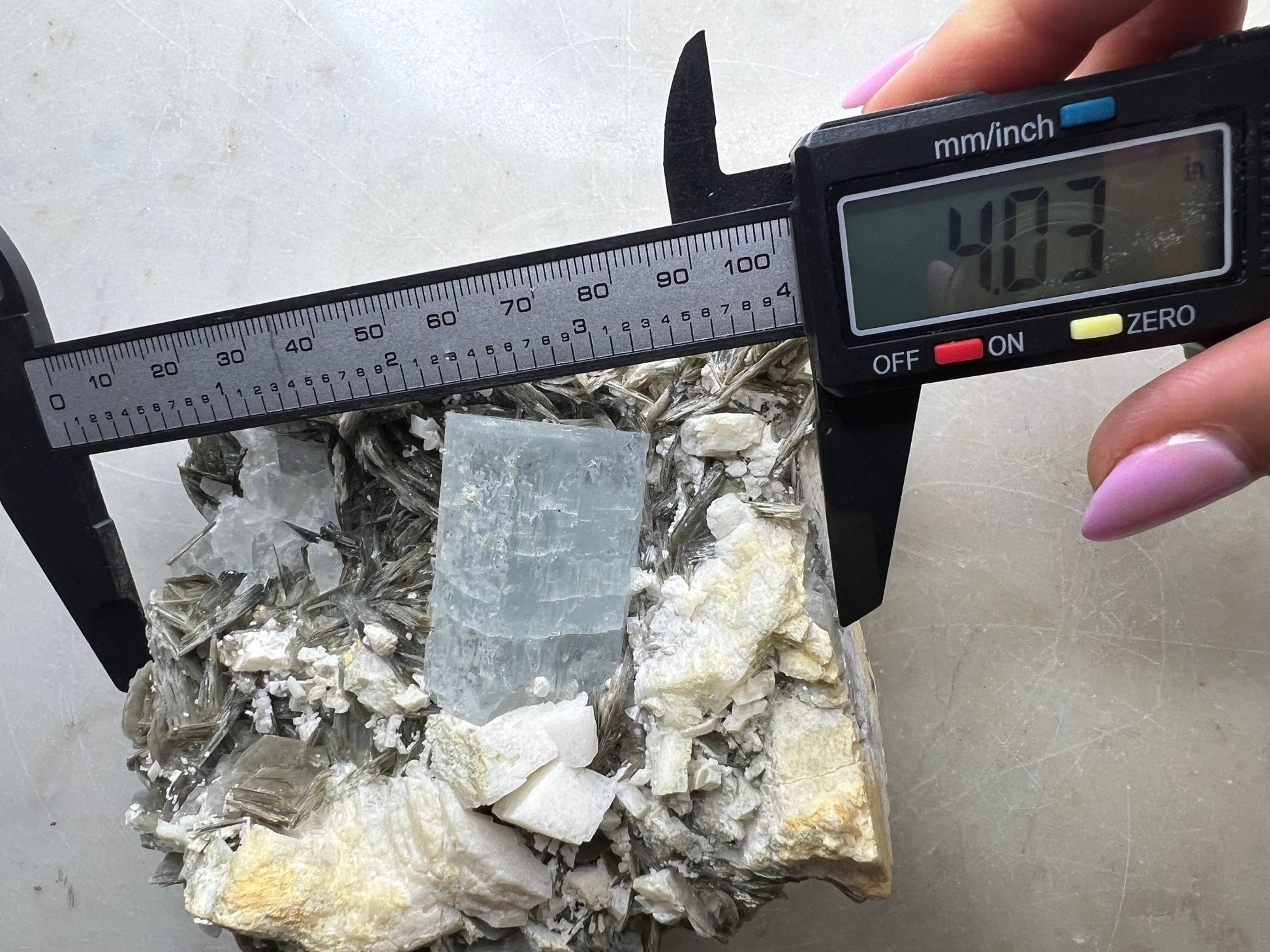 Aquamarine on muscovite 1pound 13oz