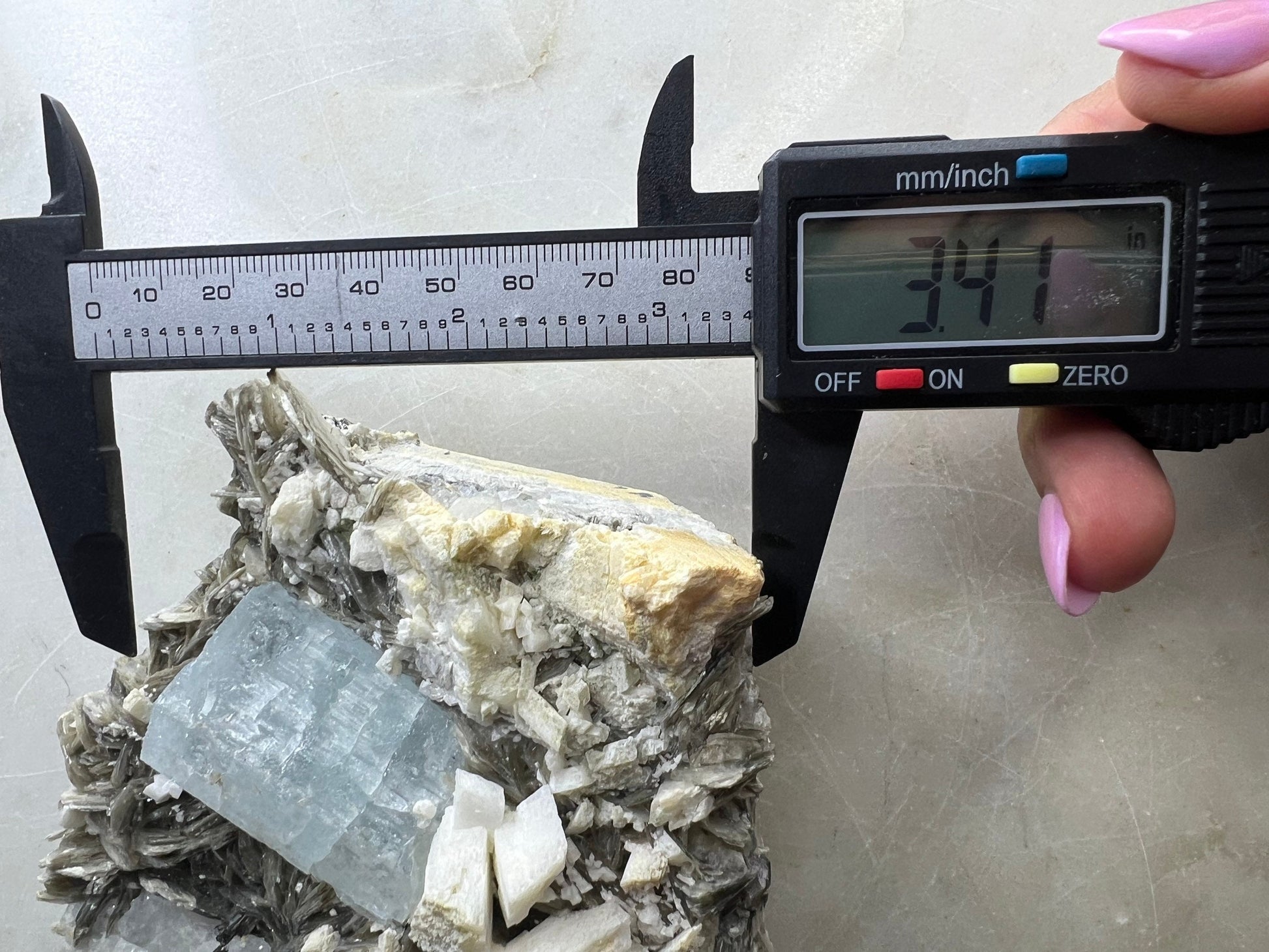 Aquamarine on muscovite 1pound 13oz
